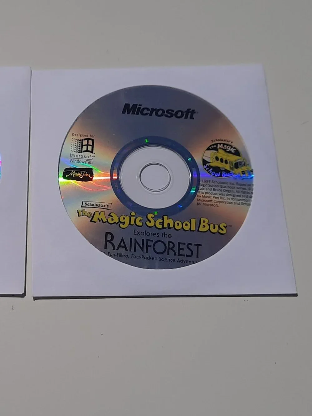 Lot of 2 Magic School Bus CD-Rom Discs Dinosaurs and Rainforest
